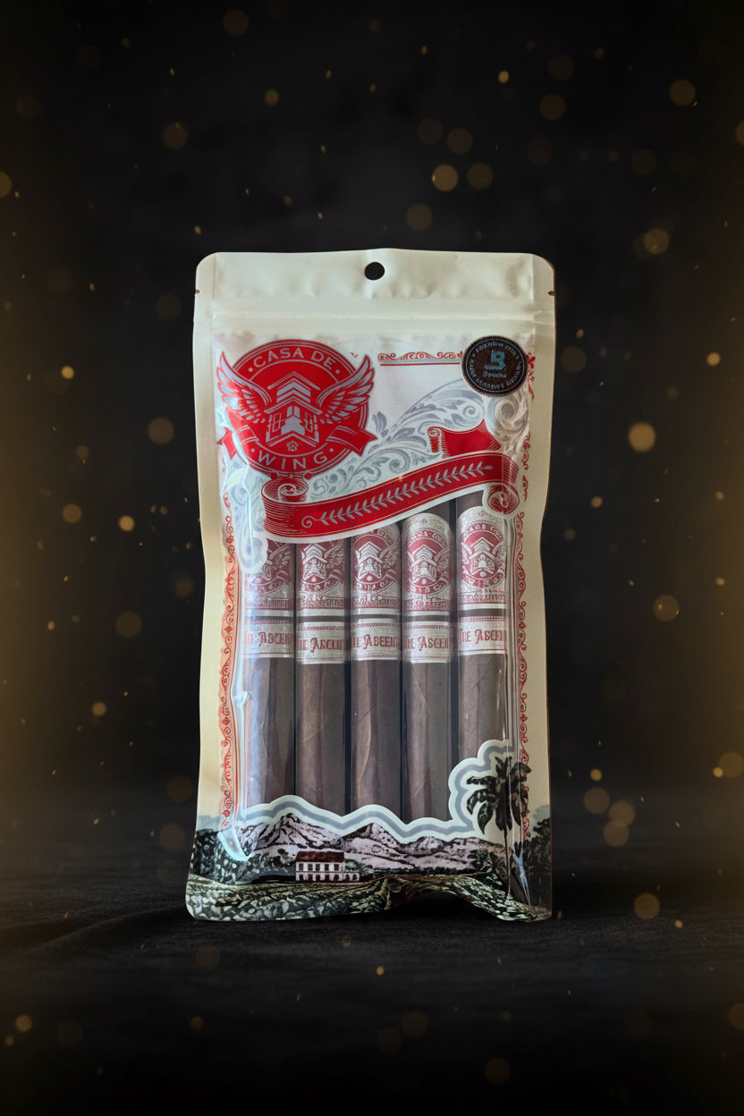 Packaged cigars with Casa de Wing branding on a wooden surface